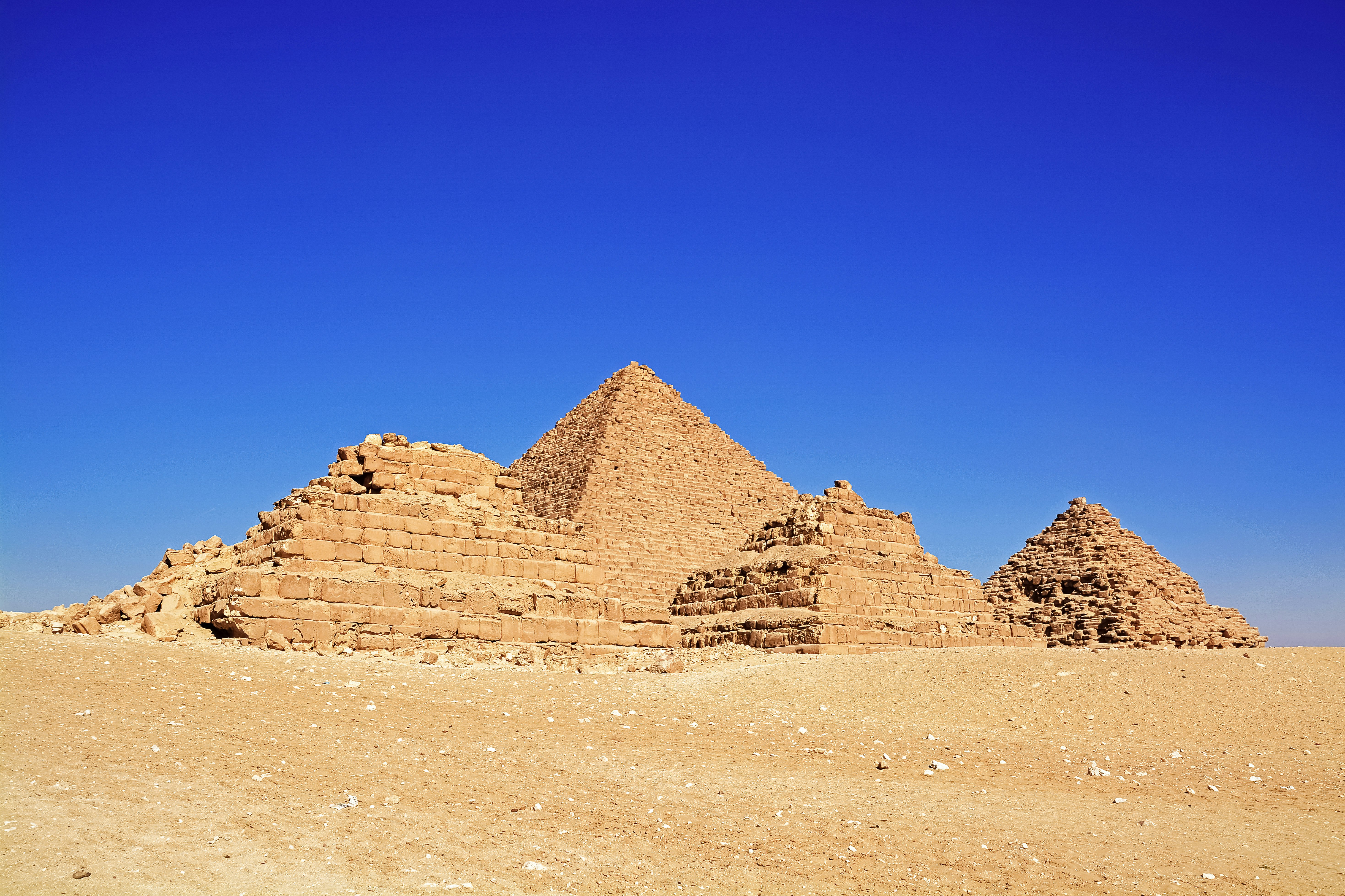 brown rock formation under blue sky during daytime